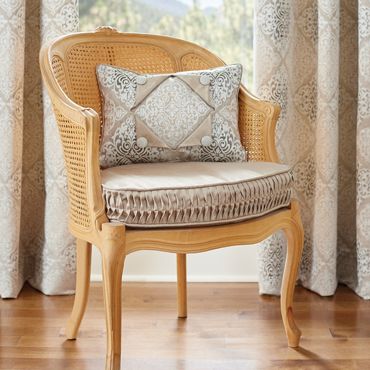 Chair Cushion with Ripple Pleat Boxing and a Pillow with Layered Design Details